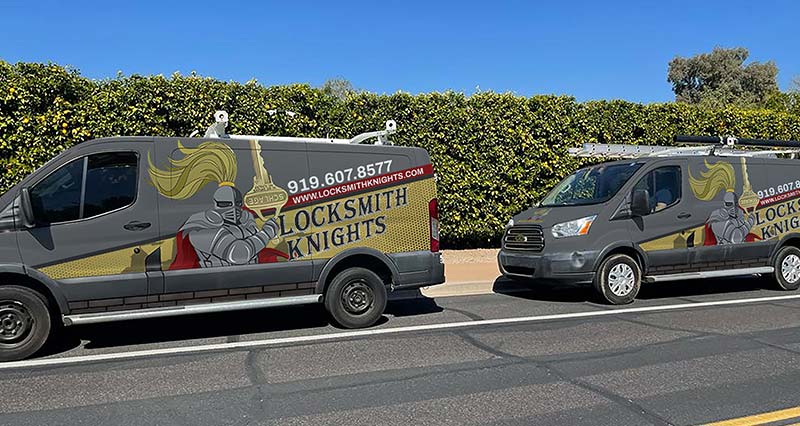 locksmith knights service vans parked